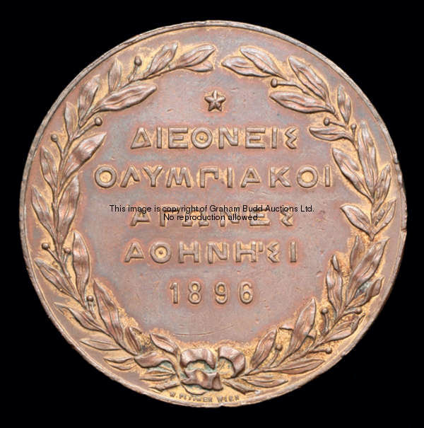 An 1896 Athens Olympic Games participation medal, gold plated bronze version, the plating now mostly...