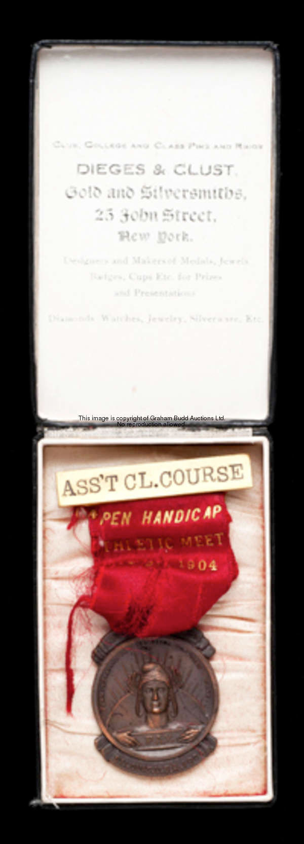 A rare 1904 St Louis Olympic Games boxed official's medal issued to an Assistant Clerk of the Course...