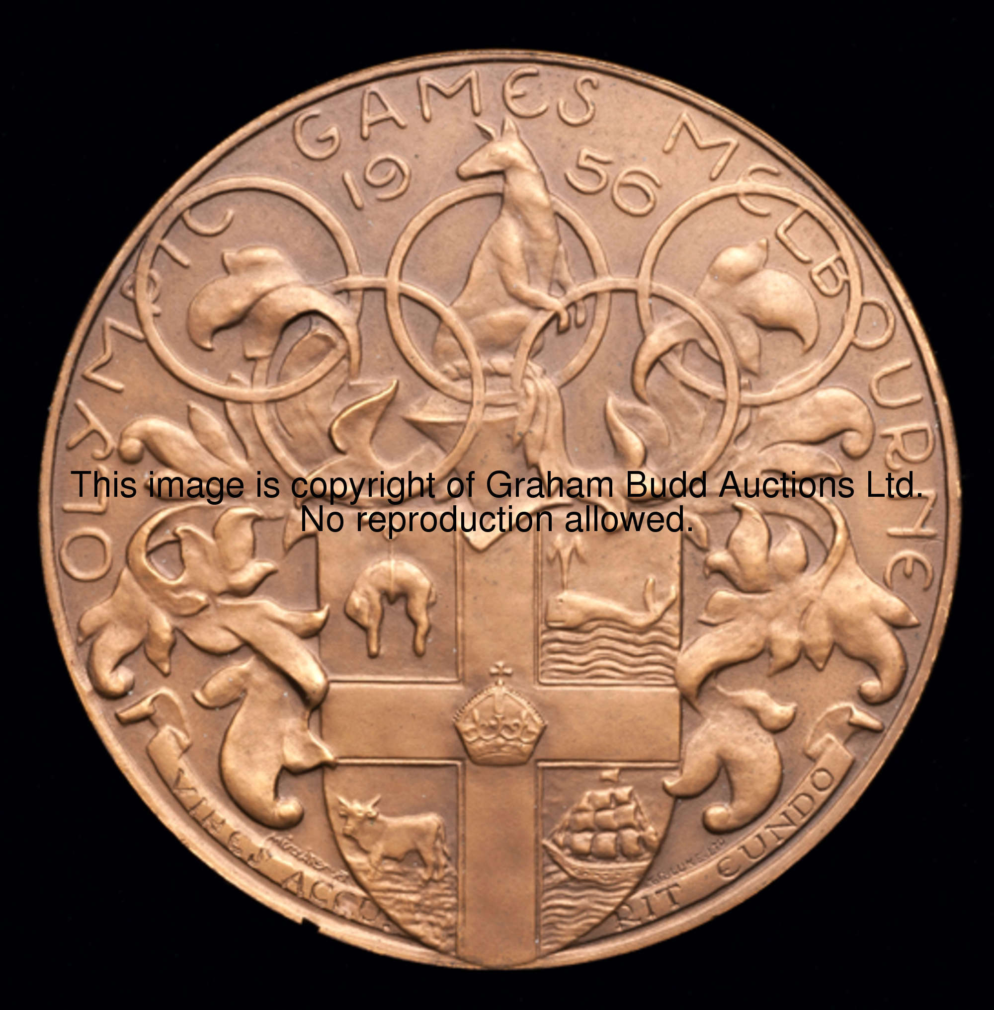 A 1956 Melbourne Olympic Games participation medal, designed by A. Meszaros, Olympic Motto within a ...