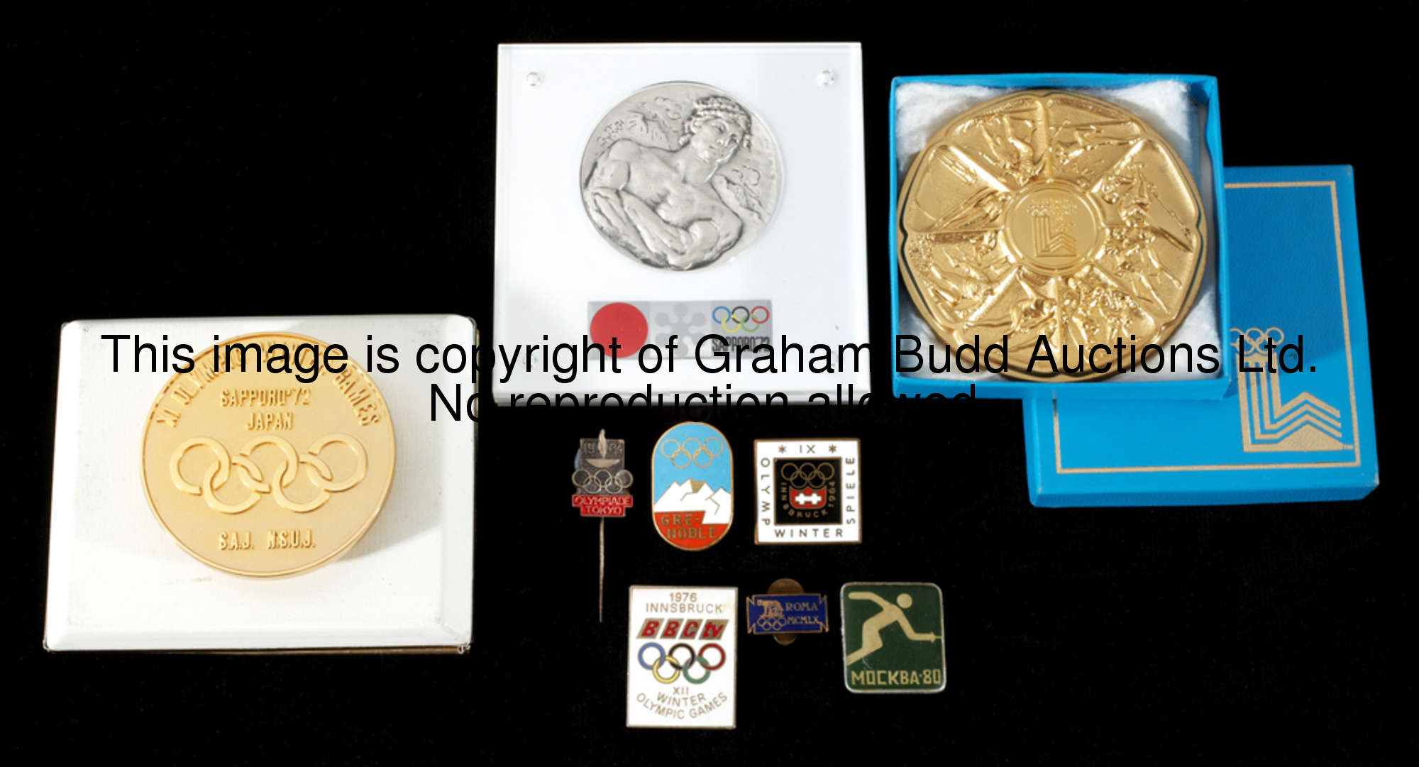 A collection of Olympic memorabilia, Summer & Winter Games 1960s onwards, including two commemorativ...
