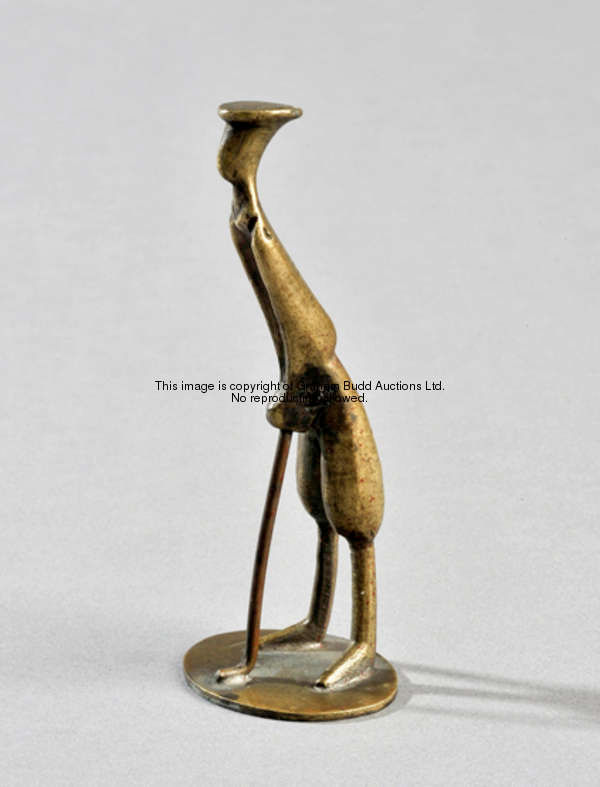 A 1930s Hagenauer bronze golfing figure, the rare small, stylised figure of a golfer wearing cap and...