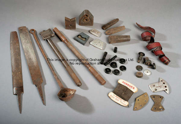 A set of traditional golf club maker's tools, stamps and accessories, including a face marker, files...