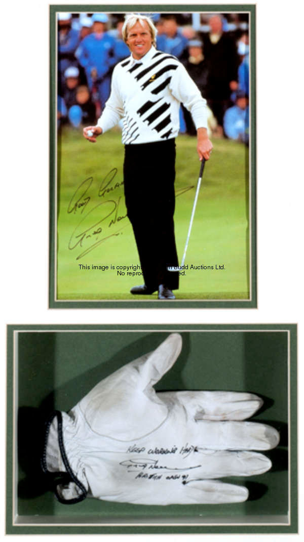 A signed Greg Norman glove and photograph display, a 10 by 6 1/2in. colour photo, the glove signed &...