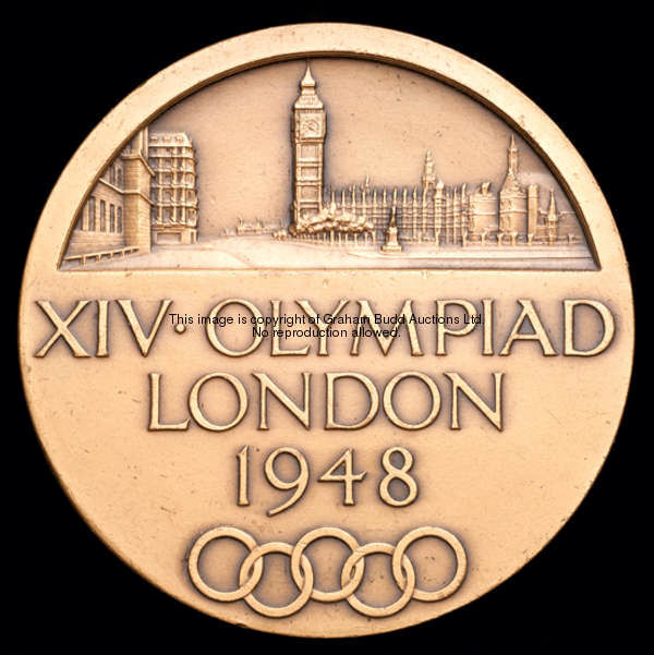 A 1948 London Olympic Games participation medal, designed by Bertram Mackennal/J. Pinches, view of W...