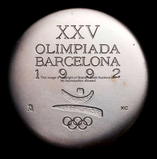 Olympic Games memorabilia, comprising: two participation medals, a 1992 Barcelona designed by Xavier...