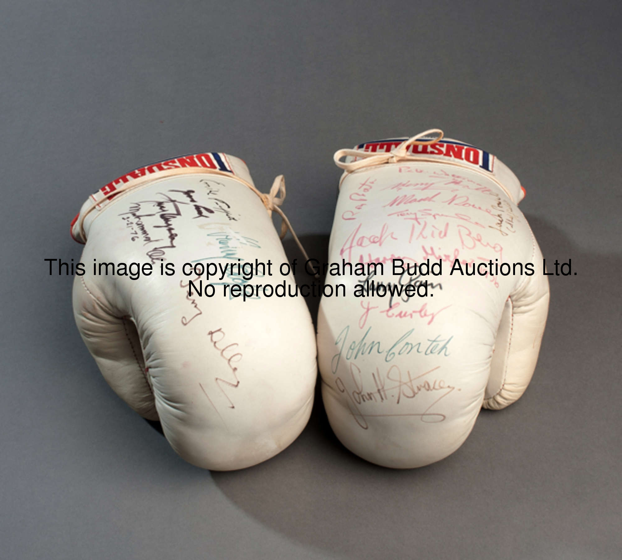 Multi-signed pair of boxing gloves, white Lonsdale gloves signed on what appears to be a significant...
