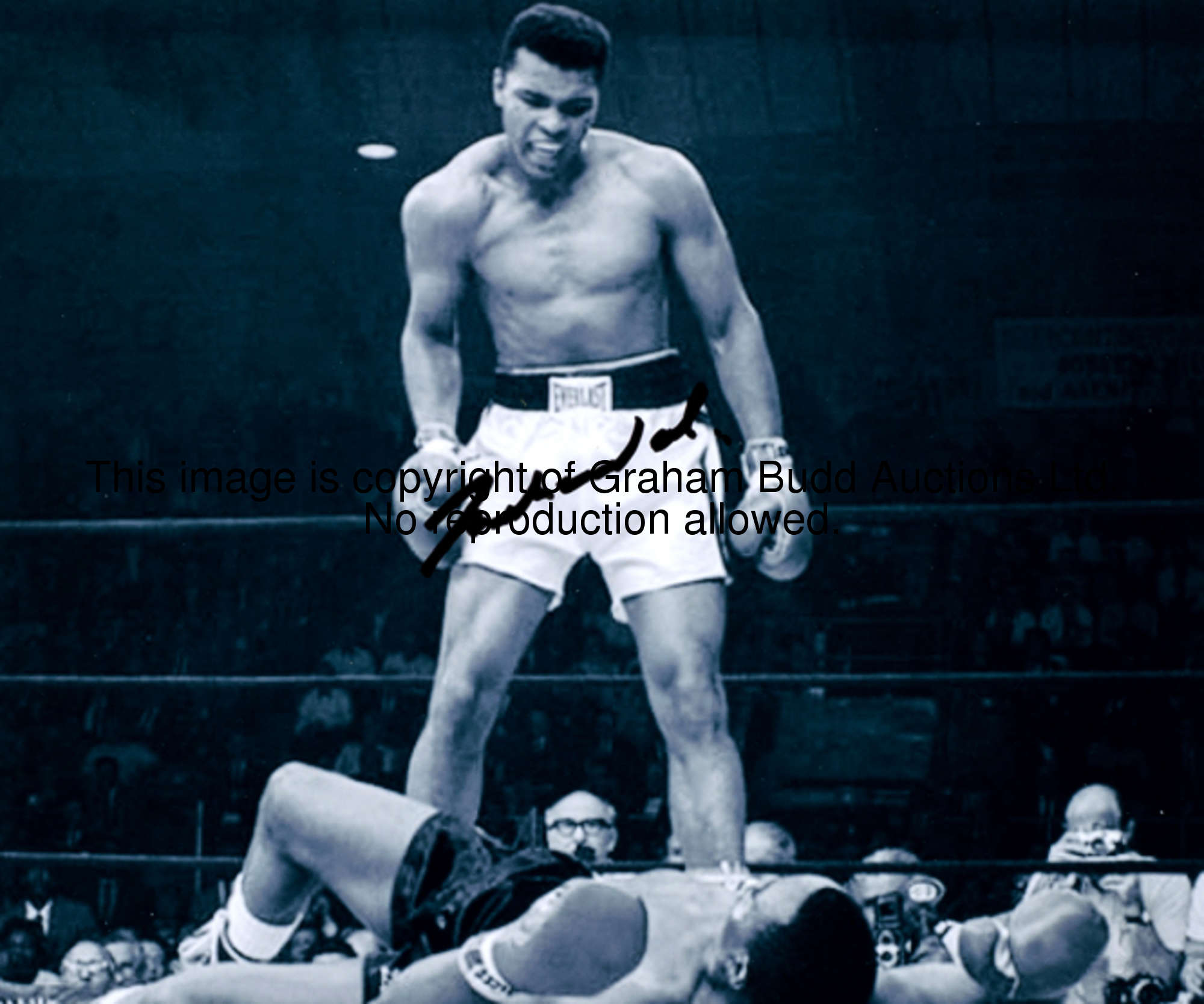 A signed Muhammad Ali photograph, b&w, 7 1/2 by 9in., signature in black marker pen