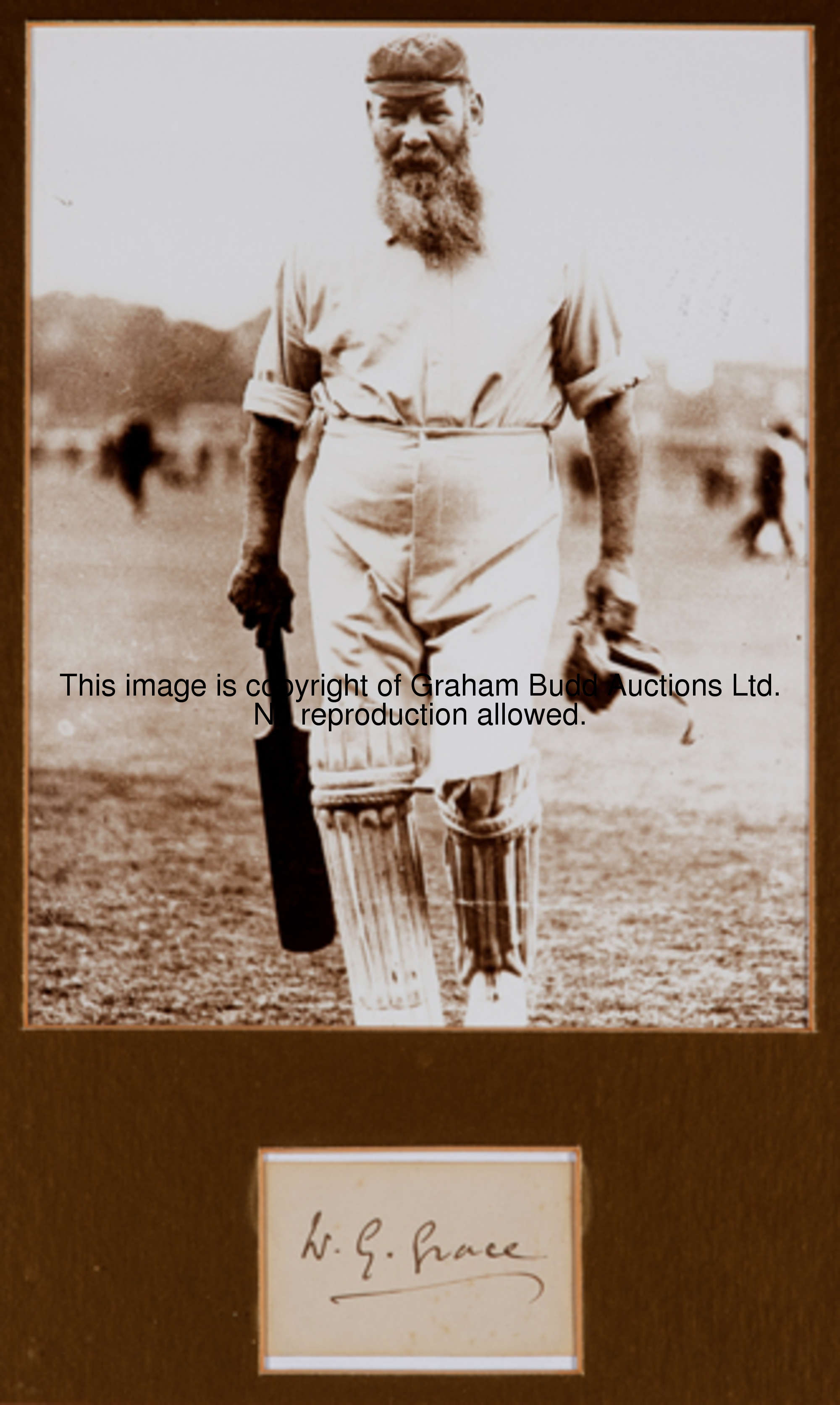 W G Grace signed presentation, the cricketer's signature in ink mounted with a picture, framed & gla...