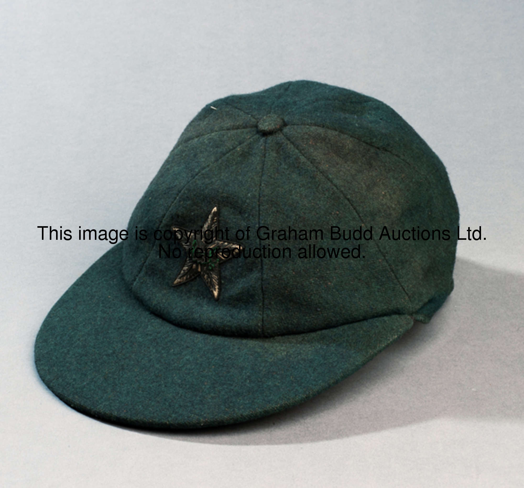 A Hanif Mohammad Pakistan Test cricket cap dated 1960, hand written name tag to interior, green by A...