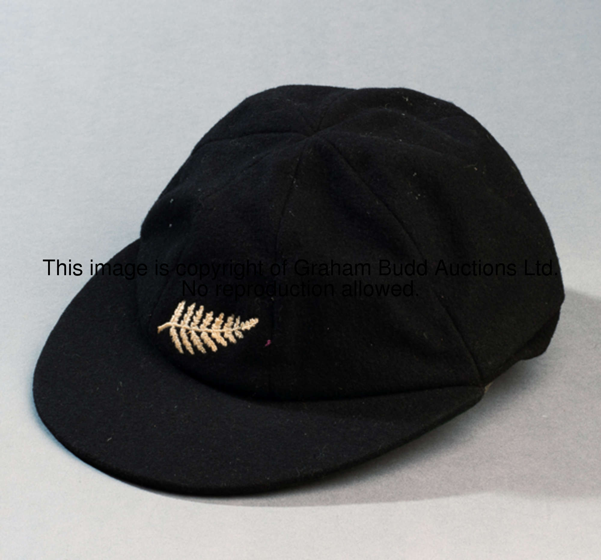 A Paul Barton New Zealand Test cricket cap circa 1962, hand written name tag to interior, black by K...