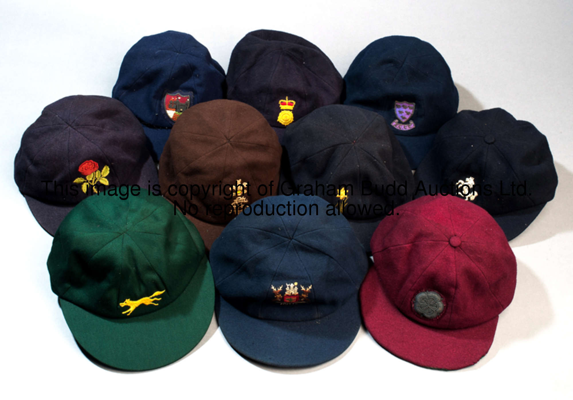 A collection of ten English county cricket caps, dating between the 1950s and 1970s, comprising: i) ...