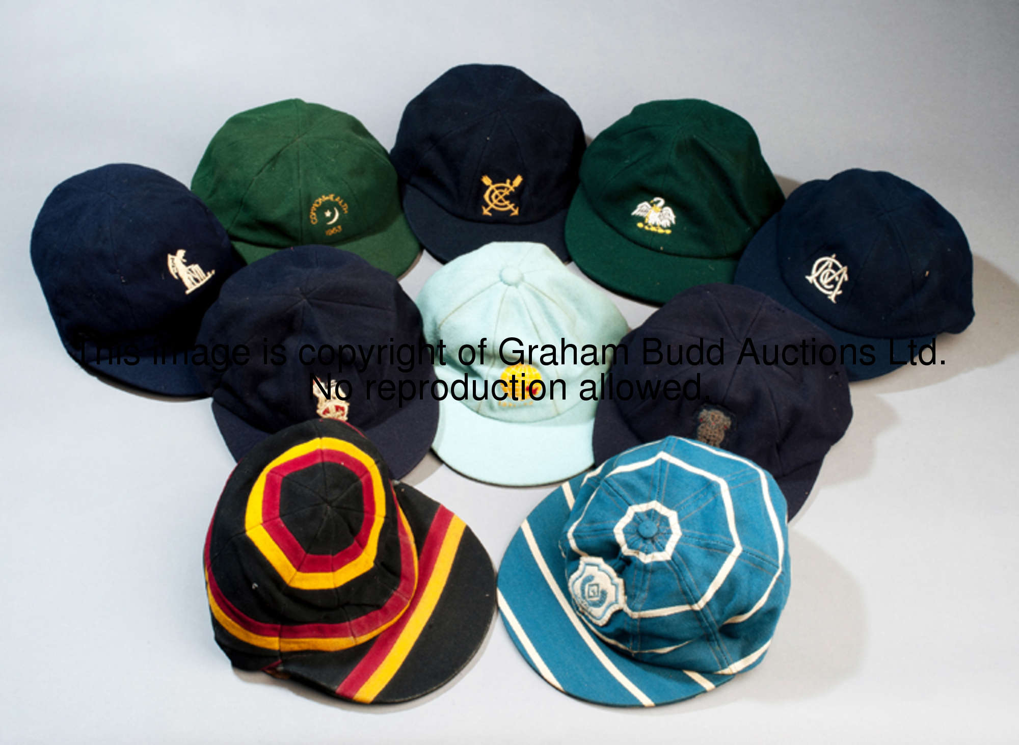 A collection of ten cricket caps, all with a reasonable vintage, comprising: i) a blue MCC cap with ...