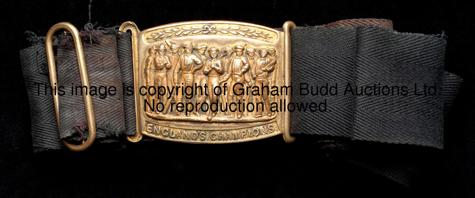 A Victorian cricketer's belt and buckle circa 1860, the belt with original brass clasp and a belt bu...
