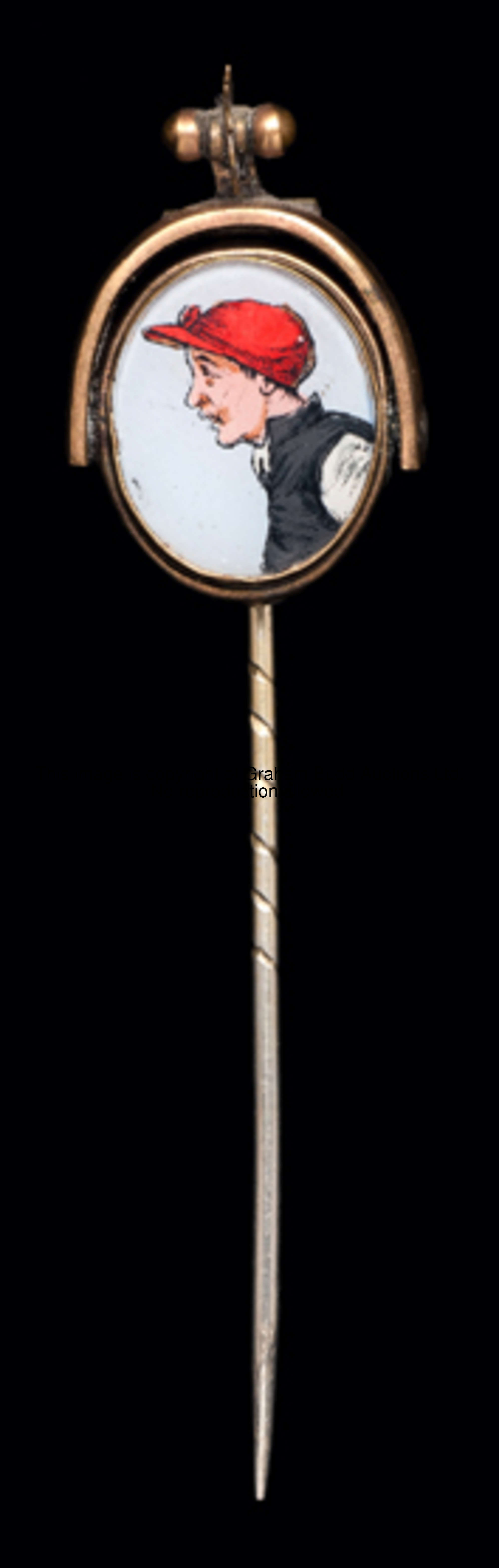 A gold & intaglio reversible stick pin of the jockey Fred Archer, the intaglio set in a stirrup desi...