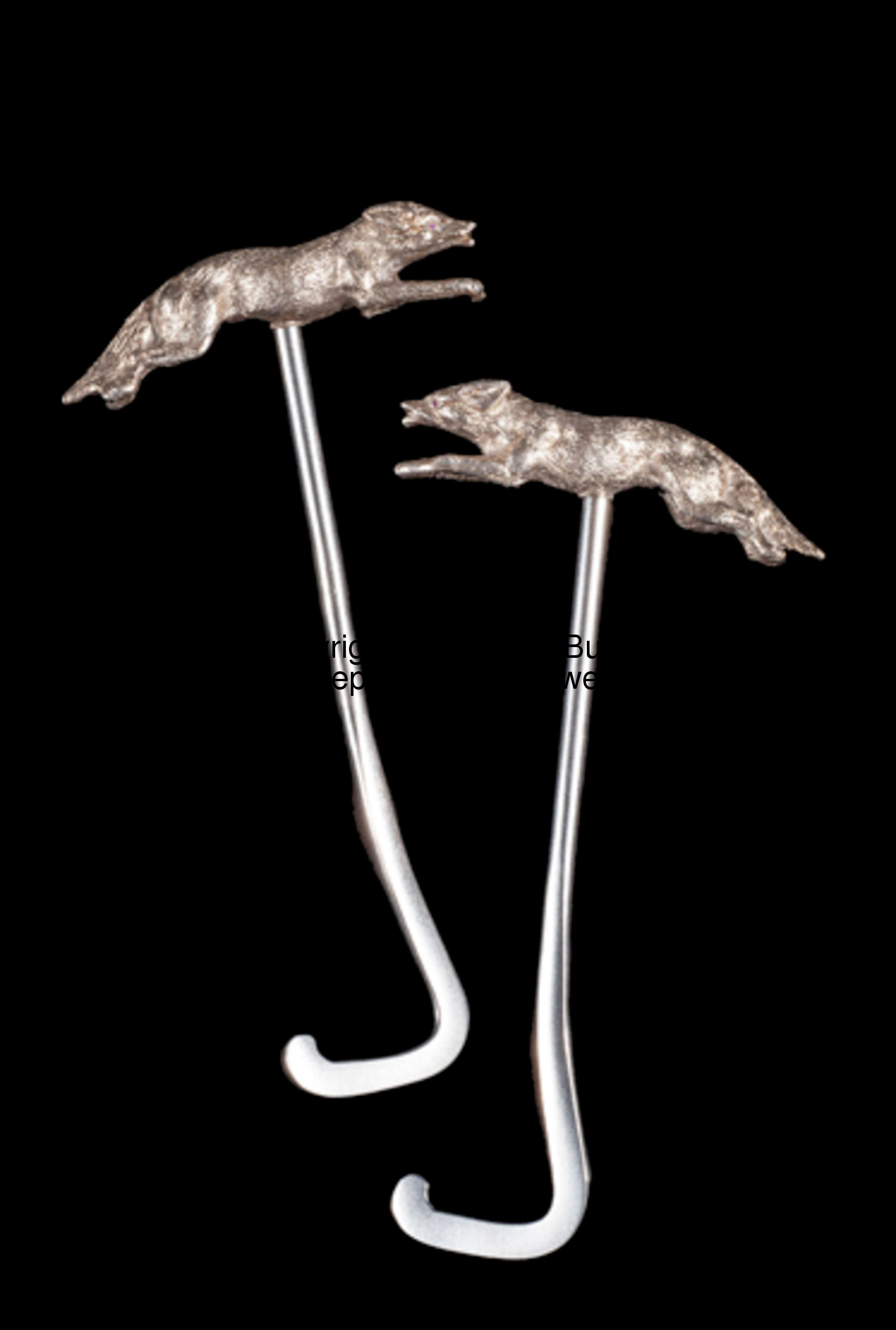 A pair of boot hooks with electroplated fox handles, running in opposite direction, 'jewelled' eyes