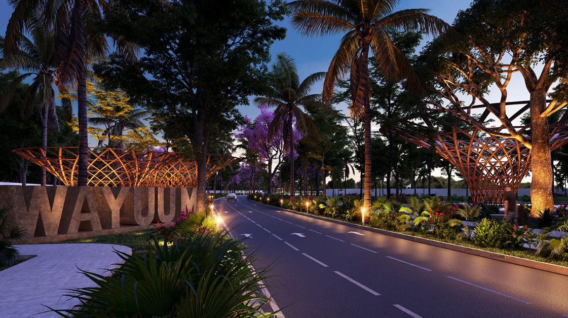 Wayúum Mérida Yucatán - Comunidad planeada y venta de lotes residenciales Acceso principal y avenida iluminada del desarrollo residencial Wayúum en Mérida Yucatán