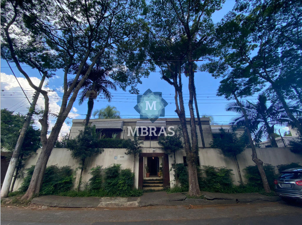 Mansão em rua fechada com portaria e portão eletrônico. - Foto 1