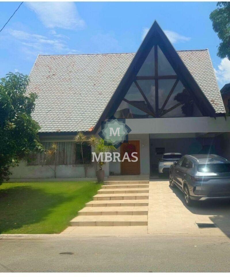 MANSÃO EM ALPHAVILLE COM PISCINA AQUECIDA E ADEGA ACÚSTICA EM PEDRAS NATURAIS