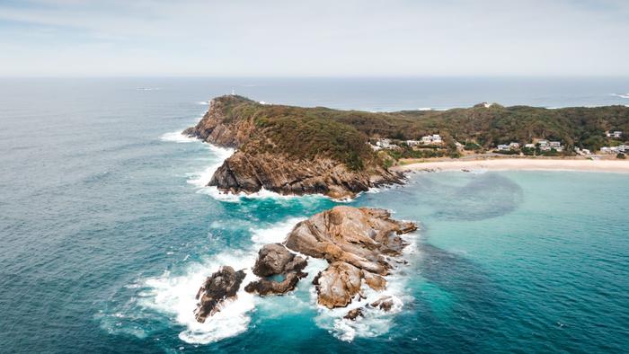 Waves crashing along rocky coastline