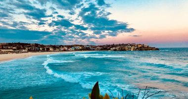 Wide shot of the waves of Bondi beach at dusk