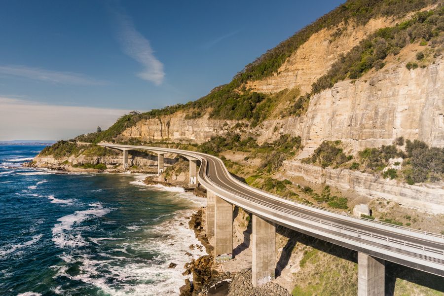 Driving on a oceanside highway in Australia