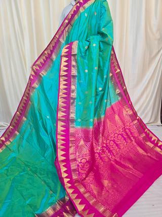 Sea Green Pure Kanjivaram Silk Saree with Rani Pink Contrast Gold Zari Brocade Pallu
