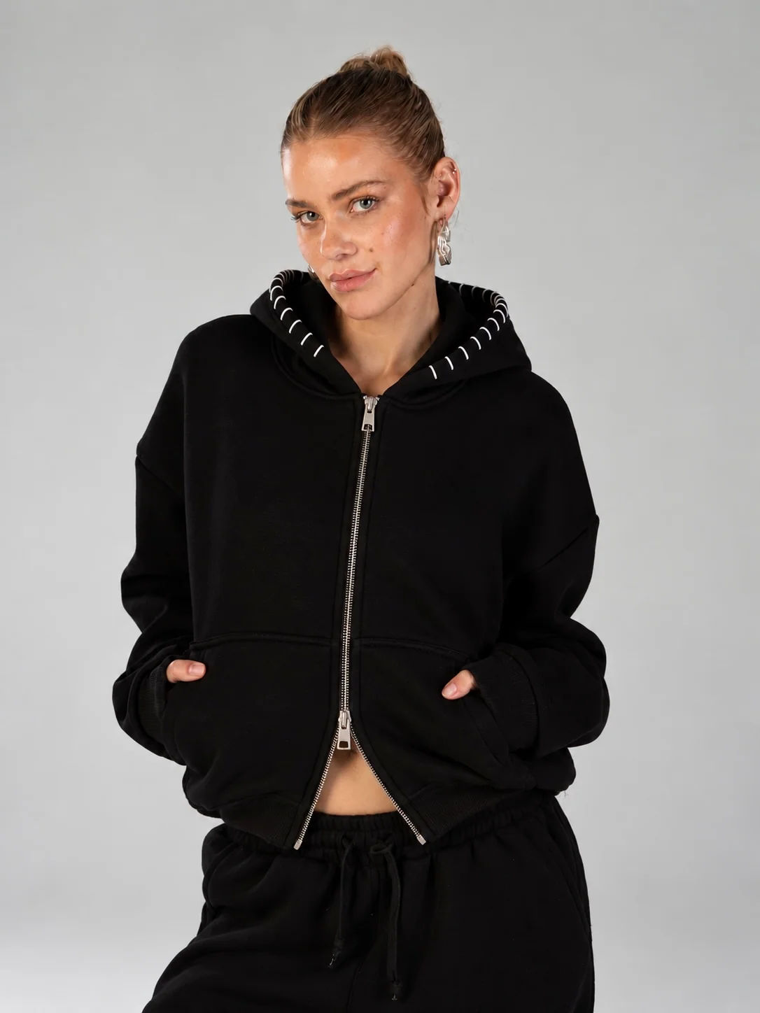 The stitched zipper in black