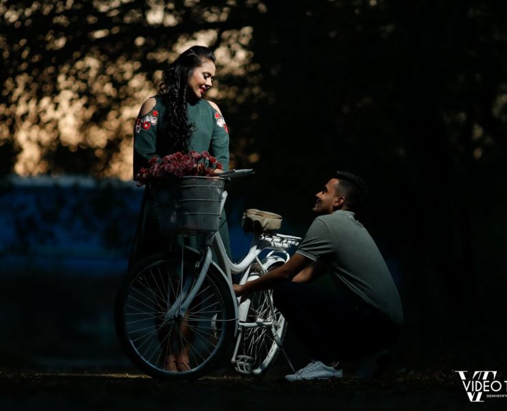 Premium Photo | Photo of thoughtful caucasian female likes riding motorbike,  poses near her fast bike, has leather jacket on shoulder, keeps hand on  helmet, looks aside with pensive expression, deep in