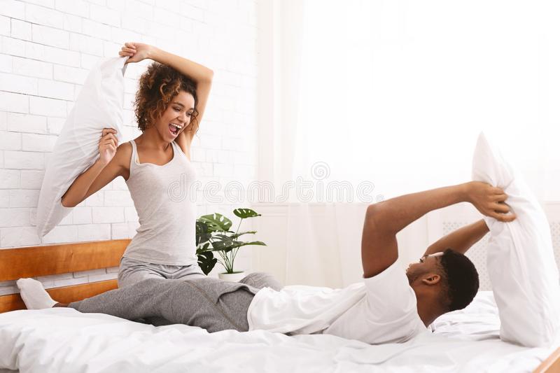 Indoor Pre-Wedding Photoshoot Ideas - fun pillow fight