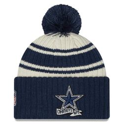 Dallas Cowboys New Era 2022 Cream NFL Sideline Sport Pom Cuffed Knit Beanie Hat