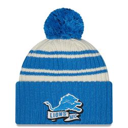 Detroit Lions New Era 2022 Cream NFL Sideline Sport Pom Cuffed Knit Beanie Hat