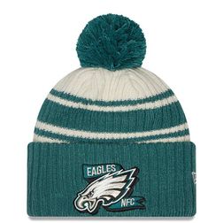 Philadelphia Eagles New Era 2022 Cream NFL Sideline Sport Pom Cuffed Knit Beanie Hat