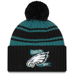 Philadelphia Eagles New Era 2022 NFL Sideline Sport Pom Cuffed Knit Beanie Hat