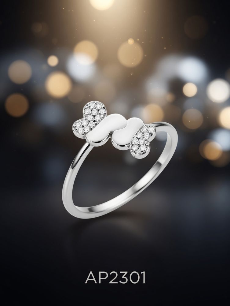 ANILLO ZIRCON DOBLE MARIPOSA PLATEADO . IMP.
