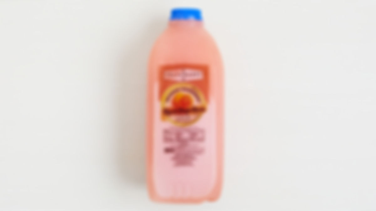 Jugo natural de toronja rosada