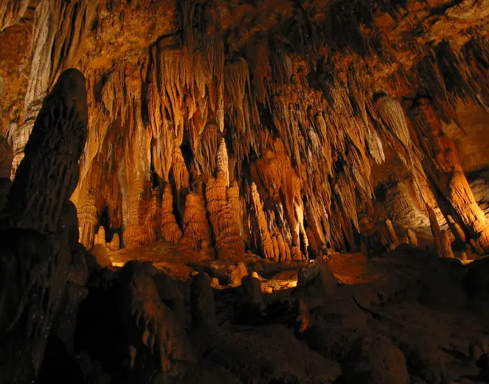 Stalagmite DeSoto Caverns in Alabama with contrasting levels of light and shadows.