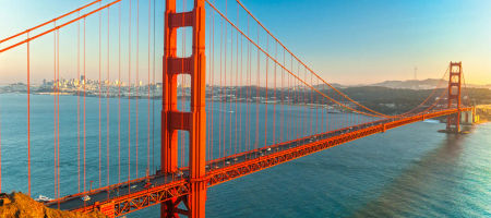 California Golden Gate Bridge in San Francisco, California at sundown during golden hour.