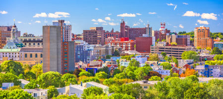 City landscape of Portland, Maine on a sunny day with high contrast and buildings.