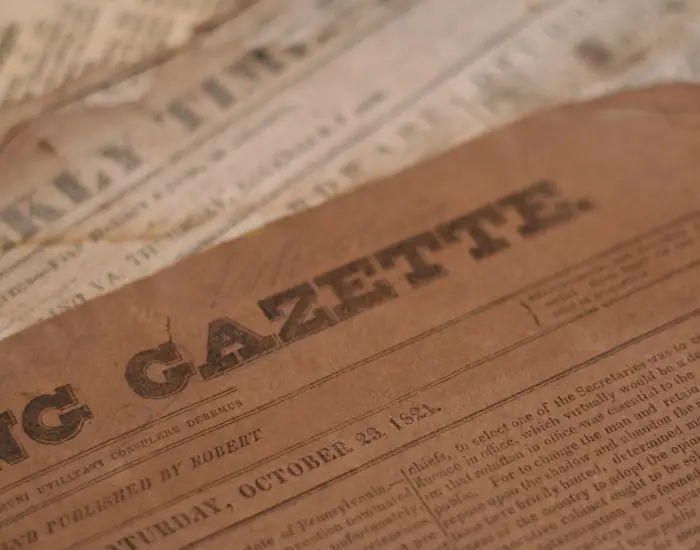 Brown vintage gazette papers similar to the Maryland Gazette.