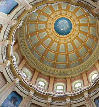 Capital Dome in Landing, Michigan with historical paintings, patterns, and architecture.