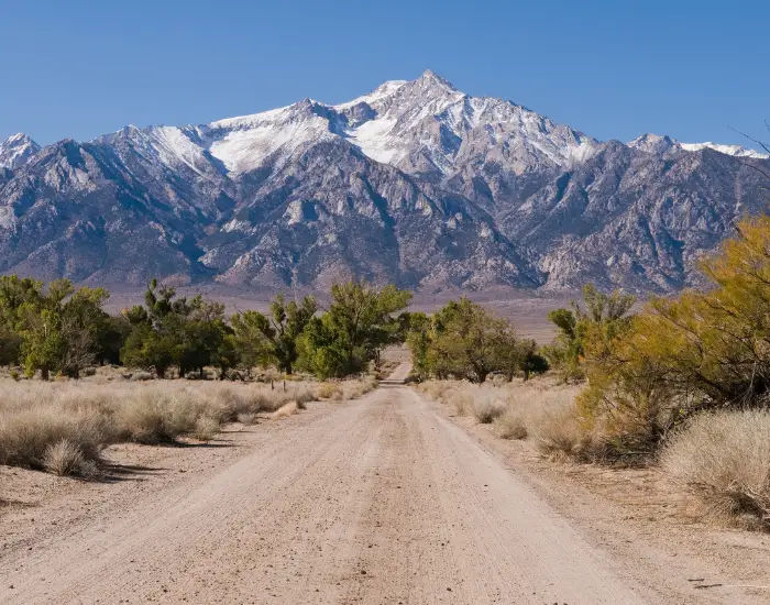 Natural road leading up to Sierra Nevadas in Nevada from Manzanar, California.