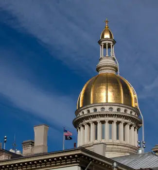 Close up of the gold dome of the New Jersey State Capitol Building in Trenton in spring.