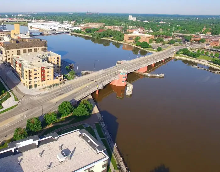 Aerial view of Downtown Wisconsin with Main Street, Fox River, and Green Bay.