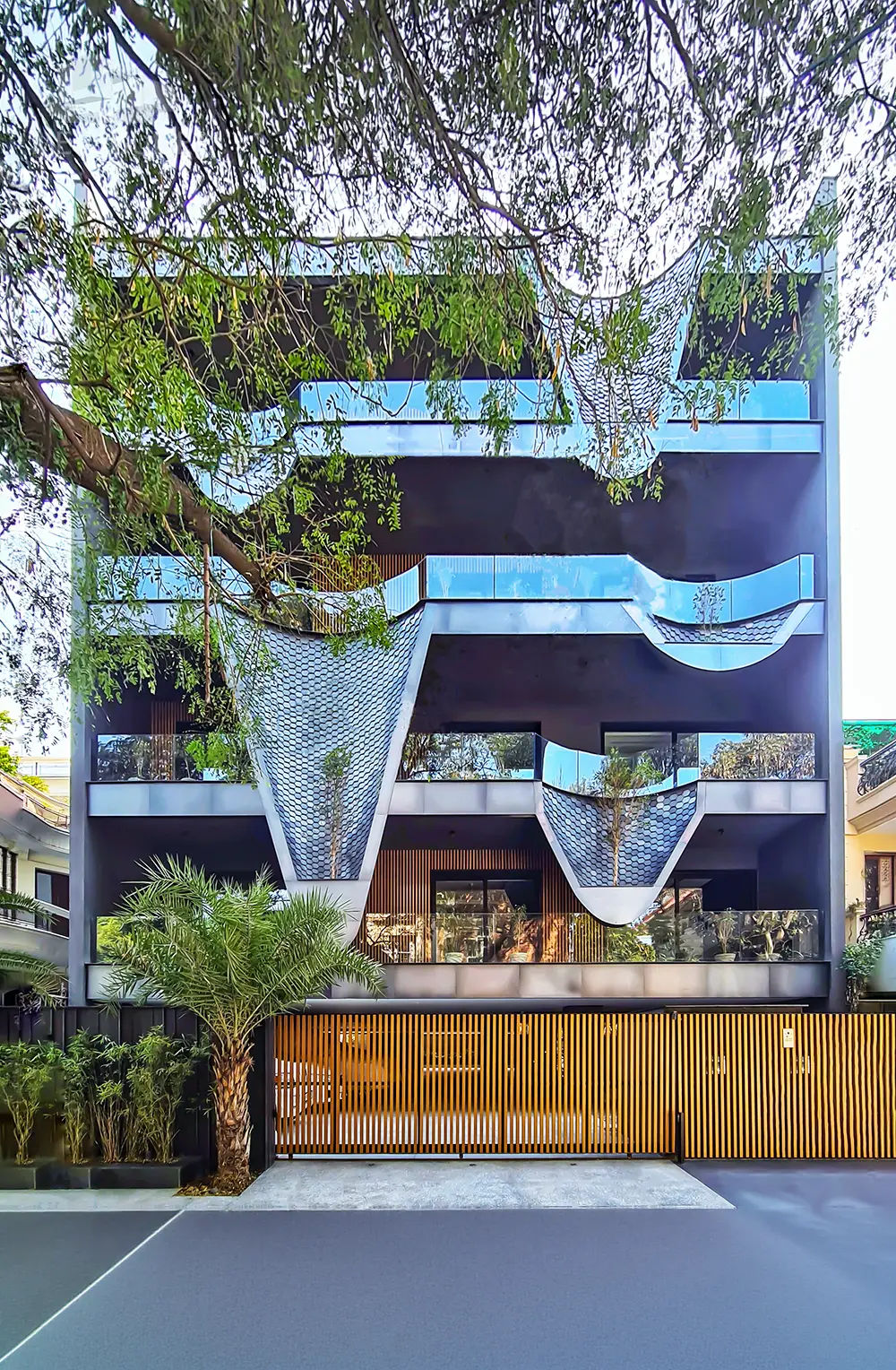 Minimalist luxury residence elevation with sculptural facade elements, modern exterior design and architectural facade detailing by Metaguise