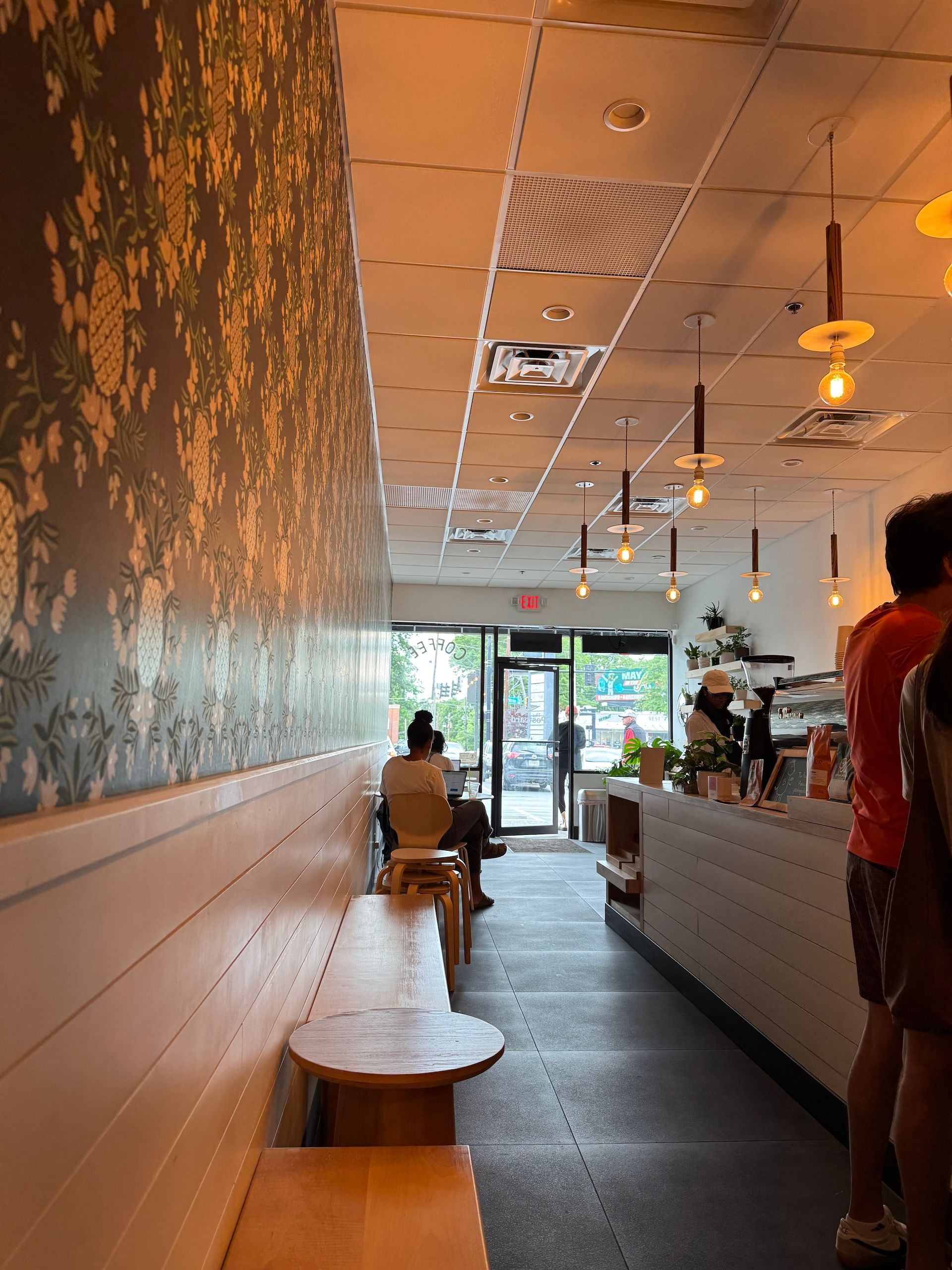 Seating along the wall of the Postcard