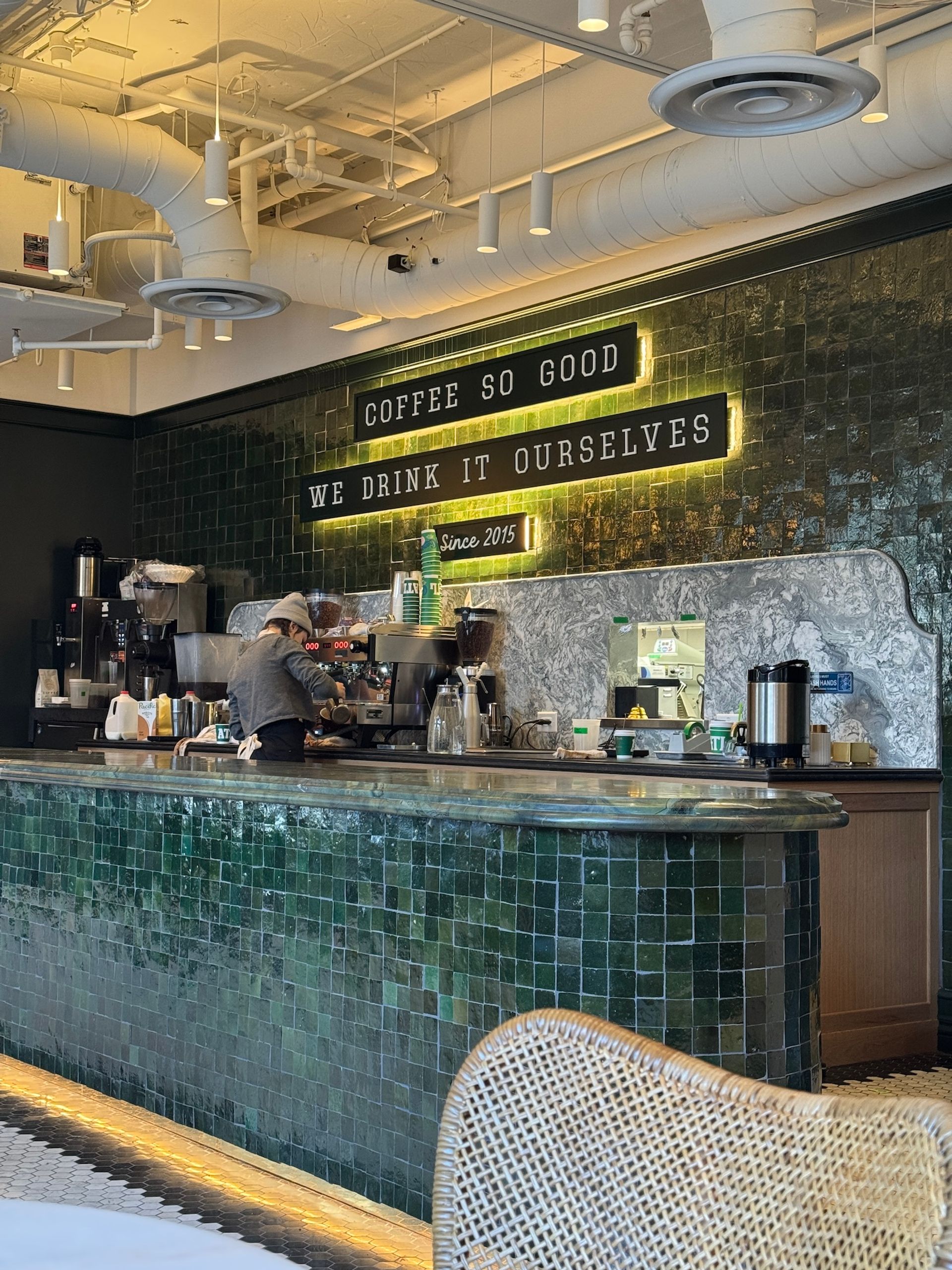 Coffee bar and barista at work