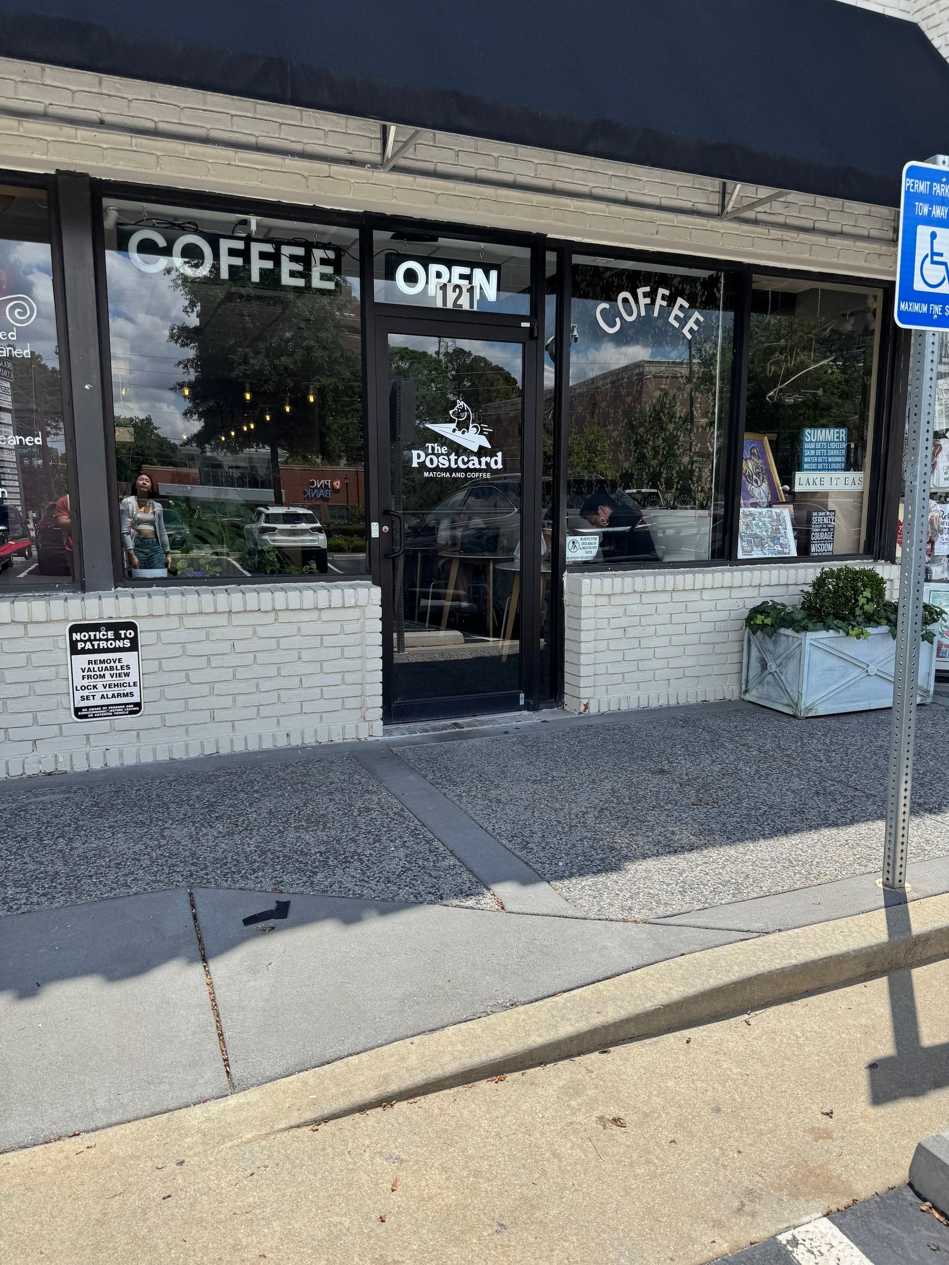 The front door of the Postcard