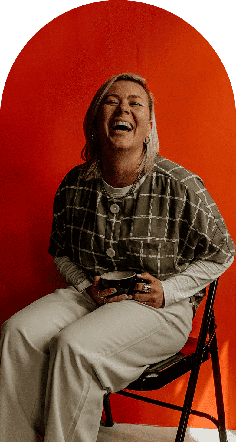 Woman laughing at the camera