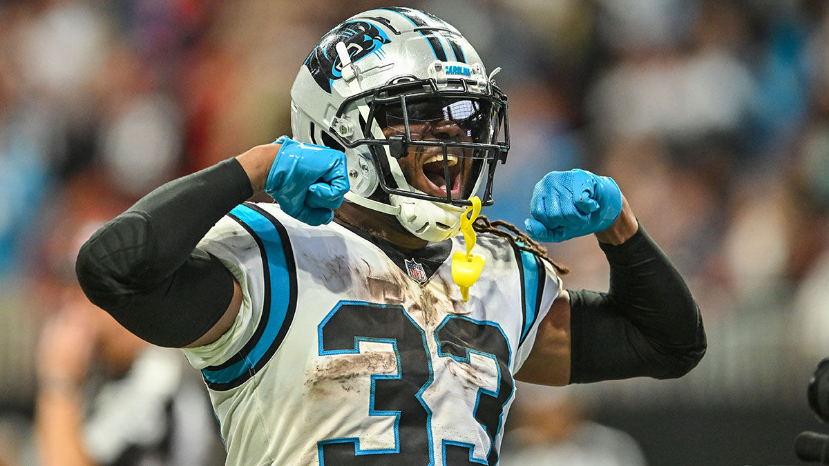 D'Onta Foreman leads Panthers past rival Falcons in rain