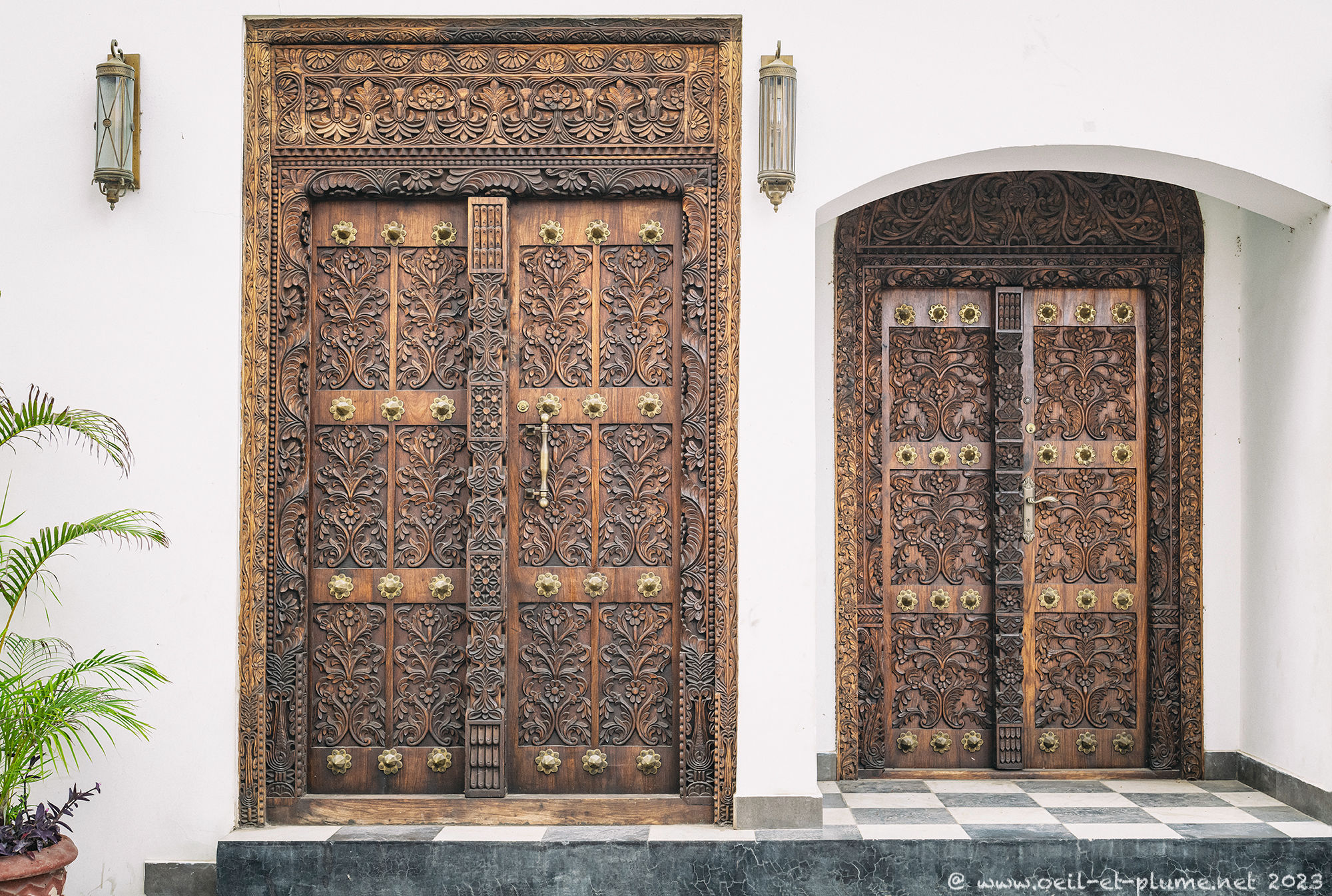 Decorated wooden door in a house in Stone Town, Stone Town, Zanzibar City